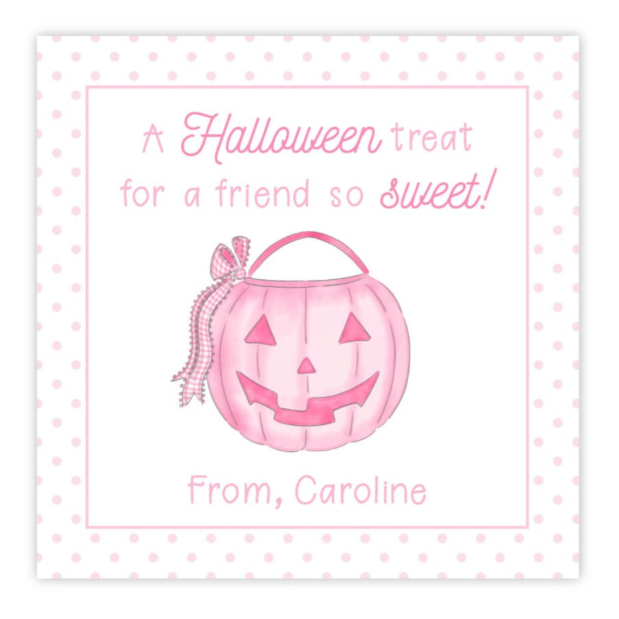 A personalized Halloween gift tag featuring a pink pumpkin design with the text 'A Halloween treat for a friend so sweet!' and a custom message 'From: Caroline'.