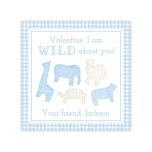 The image is a Valentine's Day card featuring a blue and white checkered border, with illustrations of various animals such as a giraffe, elephant, dog, cat, and turtle. The text on the card reads "Valentine, I am WILD about you! Your friend, Jackson".