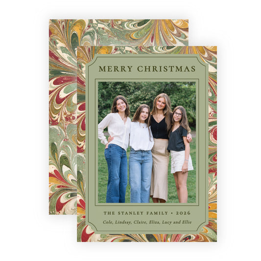 Two personalized Christmas family photos cards with a vintage marbled border in green, gold, and red, displayed on a clean white background.