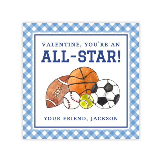 The image is a Valentine's Day card with a blue and white checkered border. It features illustrations of various sports balls, including a basketball, a football, and a soccer ball, along with the text "VALENTINE, YOU'RE AN ALL-STAR!" and "YOUR FRIEND, JACKSON".