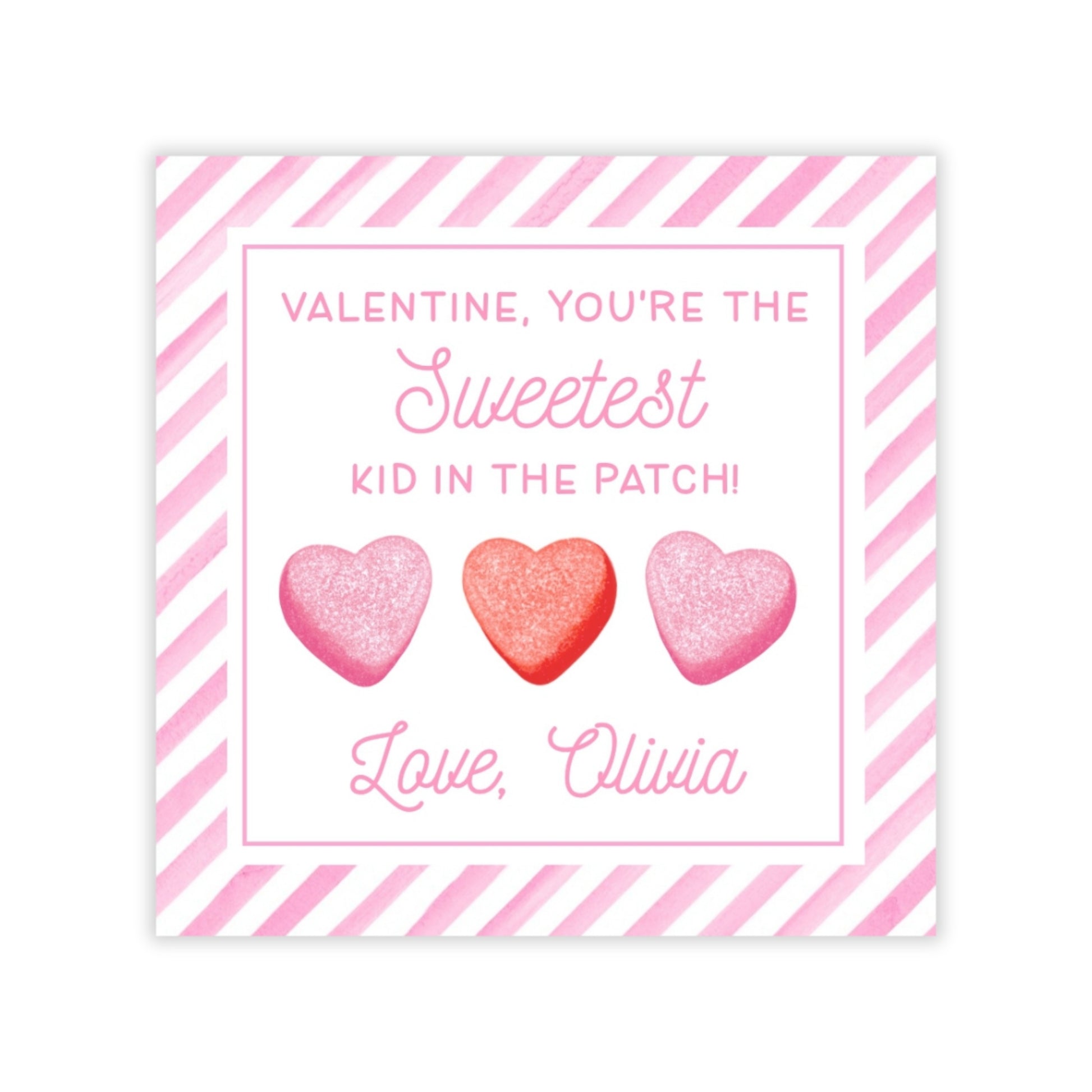 The image is a Valentine's Day card with a pink and white striped border. The card features three heart-shaped candies, each with a different color: pink, red, and pink. The text on the card reads, "Valentine, you're the Sweetest Kid in the Patch! Love, Olivia".