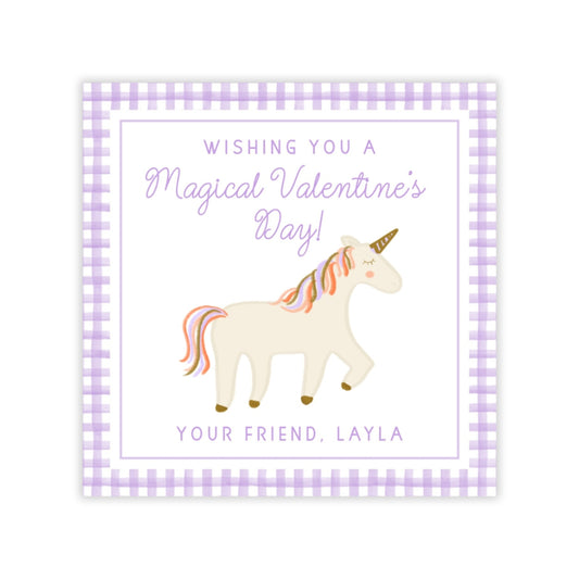 The image is a square-shaped greeting card with a purple and white checkered border. Inside the card, there is a white unicorn with a rainbow mane and tail. The card has a message that reads "Wishing you a Magical Valentine's Day! Your Friend, Layla".