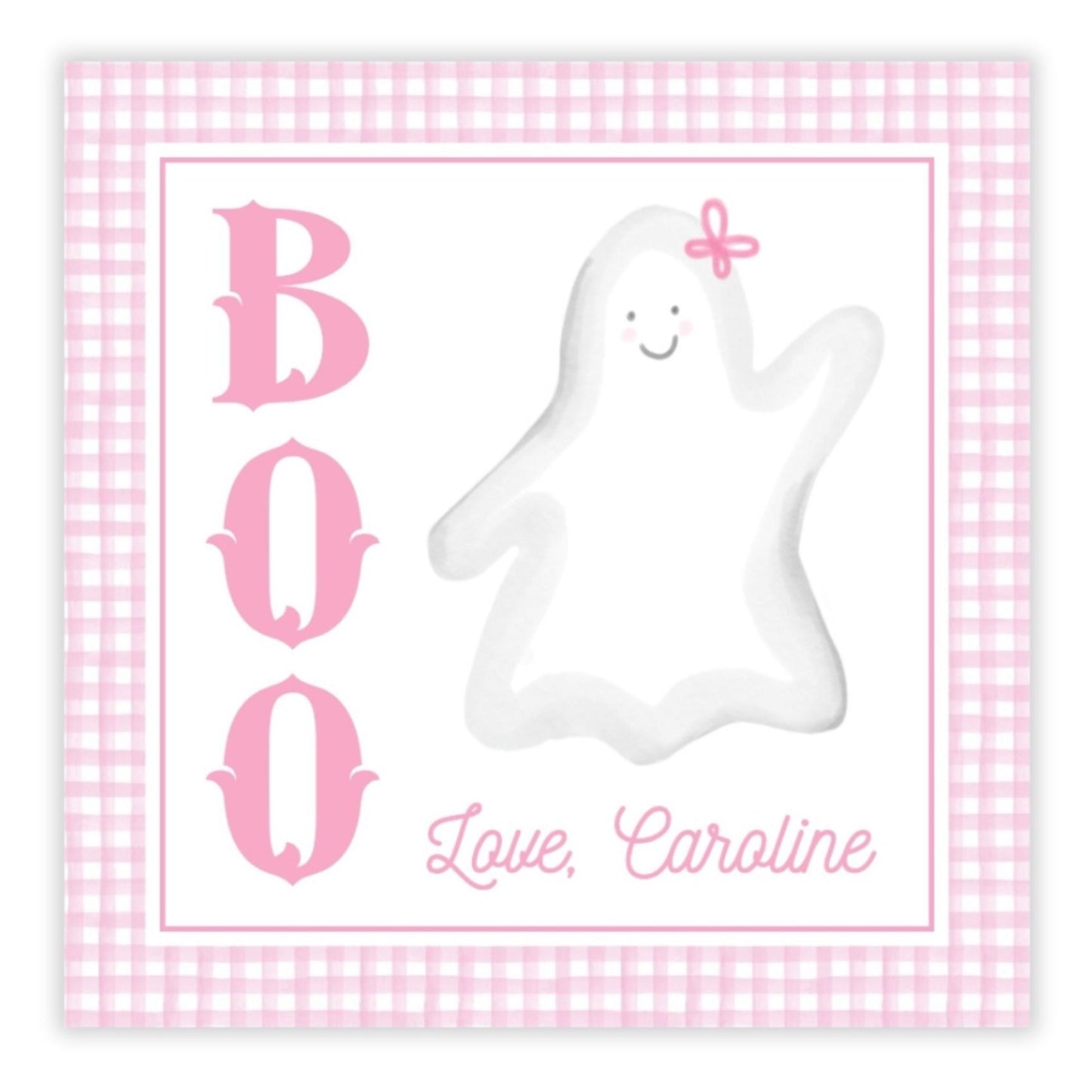 A personalized gift tag with 'BOO' and a ghost illustration, with the name 'Caroline' printed on it, set against a pink checkered background.