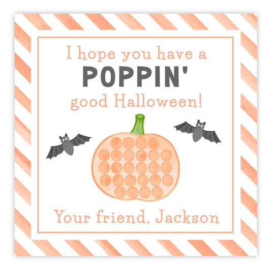 halloween gift tag with the text "I hope you have a poppin' good halloween" with a pumpkin shaped pop it and bats. Personalized with a name.