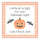 Halloween-themed card with a pumpkin, bats, and checkered border on a white background.