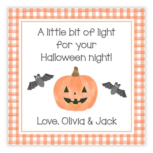 Halloween-themed card with a pumpkin, bats, and checkered border on a white background.