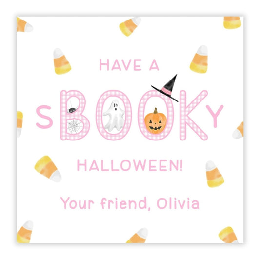 A personalized Halloween gift tag with the word 'BOOK' and a pumpkin, surrounded by candy corn graphics and a pink 'Halloween!' message.
