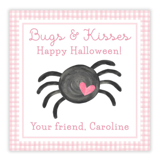 A personalized Halloween gift tag with a spider design and the text 'Bugs & Kisses Happy Halloween!' along with a personalized message for 'Caroline'.
