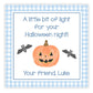 Halloween-themed card with a pumpkin, bats, and text on a blue checkered background