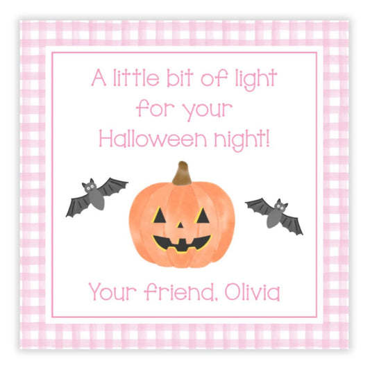 Halloween-themed card with a pumpkin, bats, and checkered border on a white background.