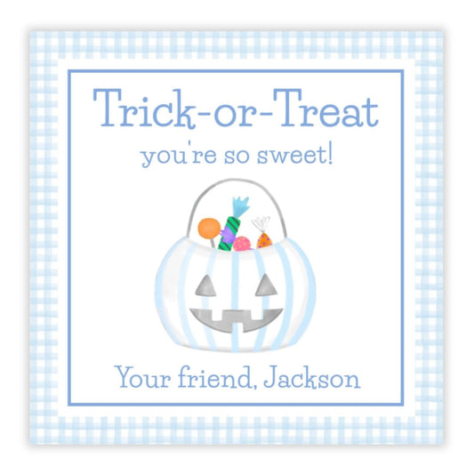 A personalized Halloween gift tag with a blue checkered background, featuring a watercolor illustration of a candy bucket with 'Trick or Treat' text and a personalized message for 'Jackson'.