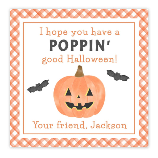 kids halloween tag featuring an orange gingham border with a pumpkin and bats and the text "I hope you have a POPPIN halloween" perfect for popcorn and pop it fidget toys.