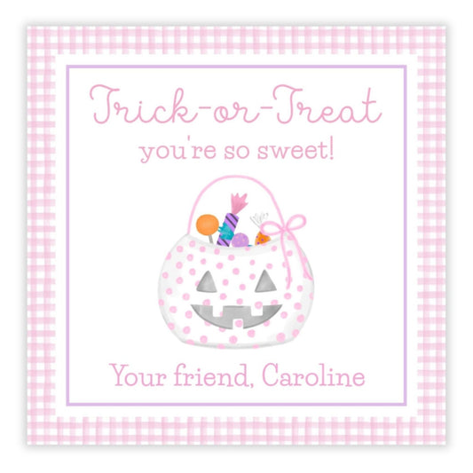 A personalized gift tag with a pink checkered background featuring a watercolor design of a candy bucket with 'Trick or Treat' text and a personalized message.