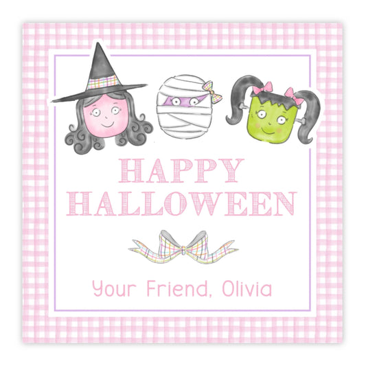 A personalized Halloween gift tag with a 'Happy Halloween' message, featuring watercolor illustrations of a smiling pumpkin, a mummy, and a green monster. The tag has a pink background, and a custom text area for personalization.