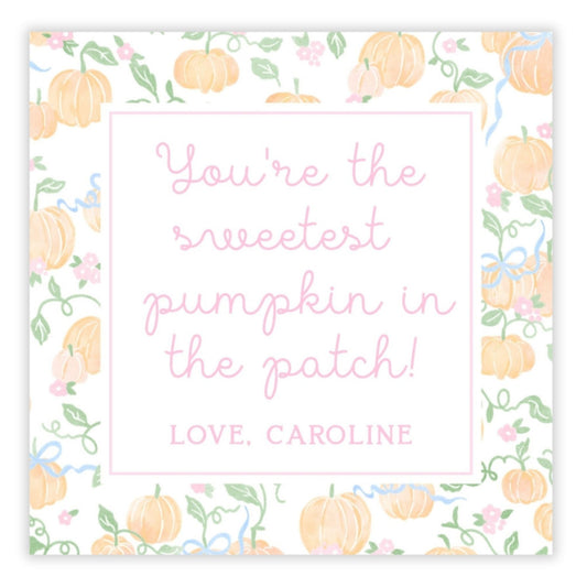 A personalized Halloween gift tag with a floral and pumpkin design, featuring a message that reads 'You're the SWEETEST PUMPKIN in the PATCH!' with a custom name 'Caroline'.